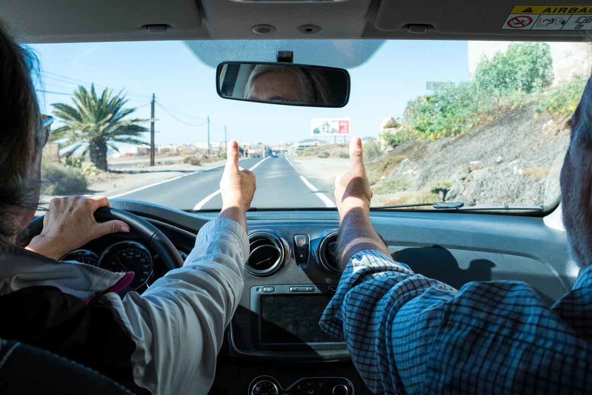 Driver and Passenger Giving Thumbs Up  